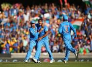 SYDNEY, AUSTRALIA - MARCH 26:  Umesh Yadav of India celebrates after taking the wicket of Aaron Finch of Australia during the 2015 Cricket World Cup Semi Final match between Australia and India at Sydney Cricket Ground on March 26, 2015 in Sydney, Australia.  (Photo by Ryan Pierse/Getty Images)